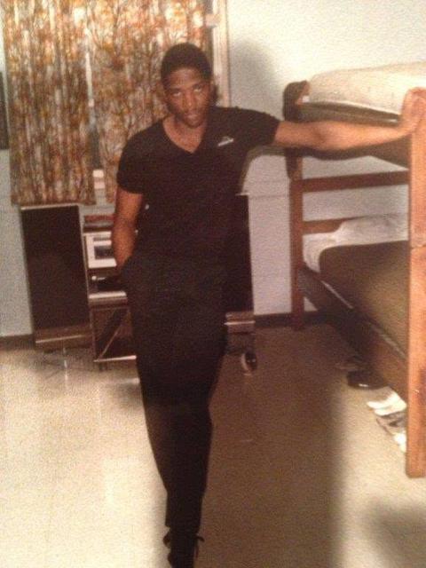 Young man in a dorm room