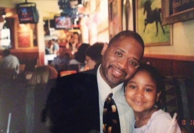 Father and daughter at a restaurant