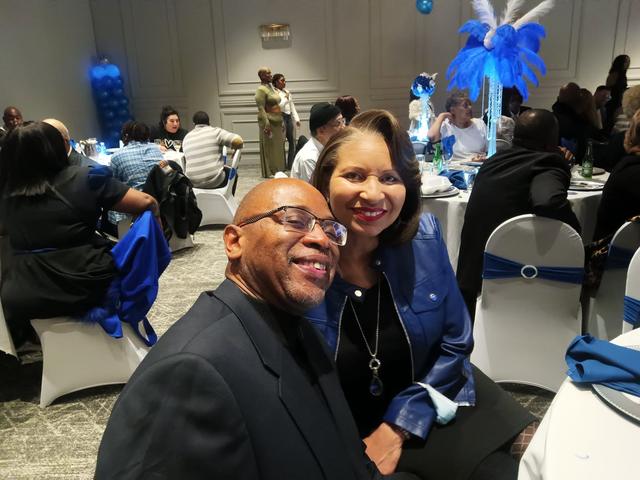 Celebration with blue and white balloons