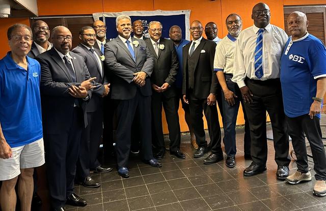 Fraternity brothers at a meeting