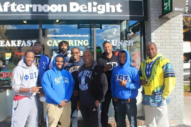 Fraternity brothers outside a café