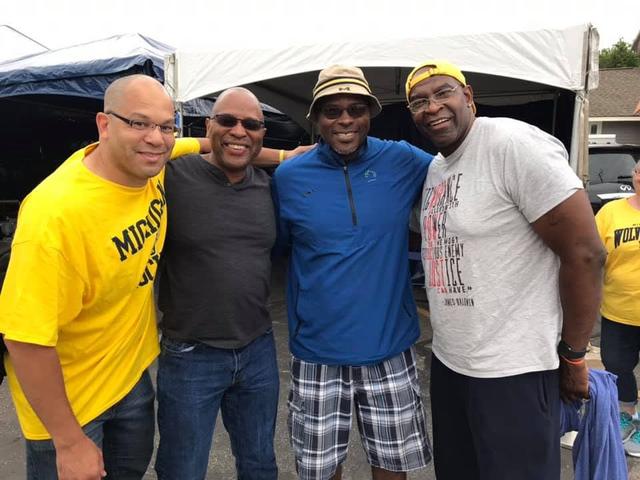 Friends at a Michigan tailgate